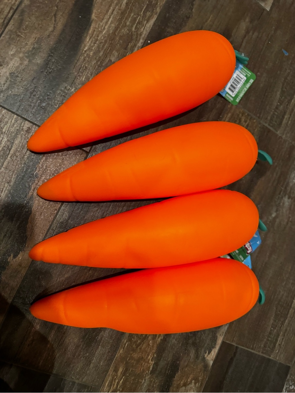 Set of four squeezy carrots